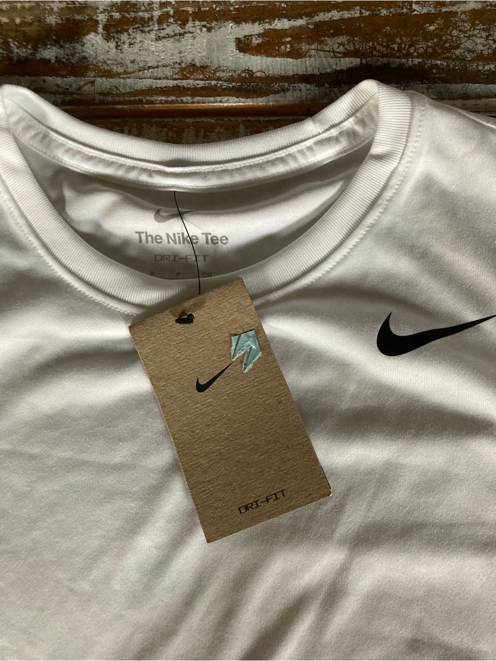Nike White Women's Training Tee with Subtle Gray Logo